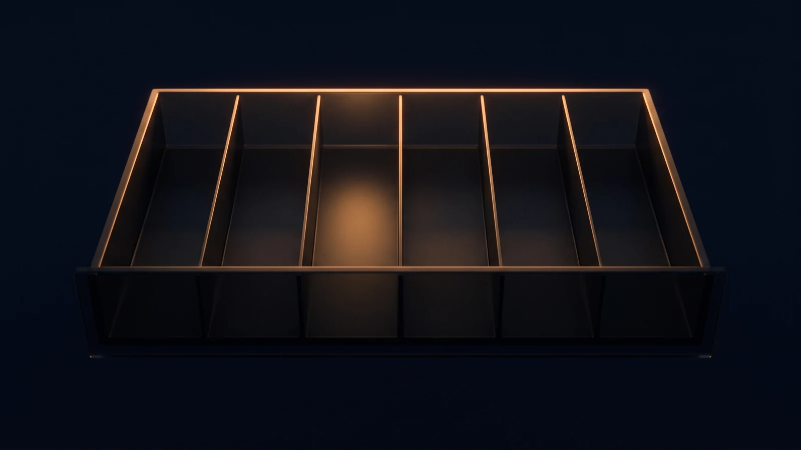 A broad dark cash drawer in a deep blue void pulled fully open, its tray divided into six identical empty blank compartments, the third compartment from the left lit warm amber from low inside and the other five dark
